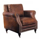 Кожаное красивое кресло в коричневом тоне