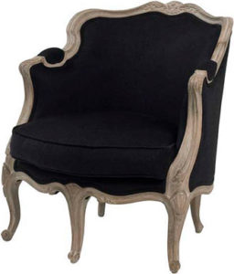 Мягкое кресло, оформленное в черном цвете