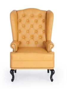 Желтое пастельное кресло для интерьера